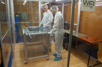 Polish engineers preparing FWA(Filter Wheel Assembly) model for acoustic tests in Technical Acoustics Laboratory of AGH University of Science and Technology